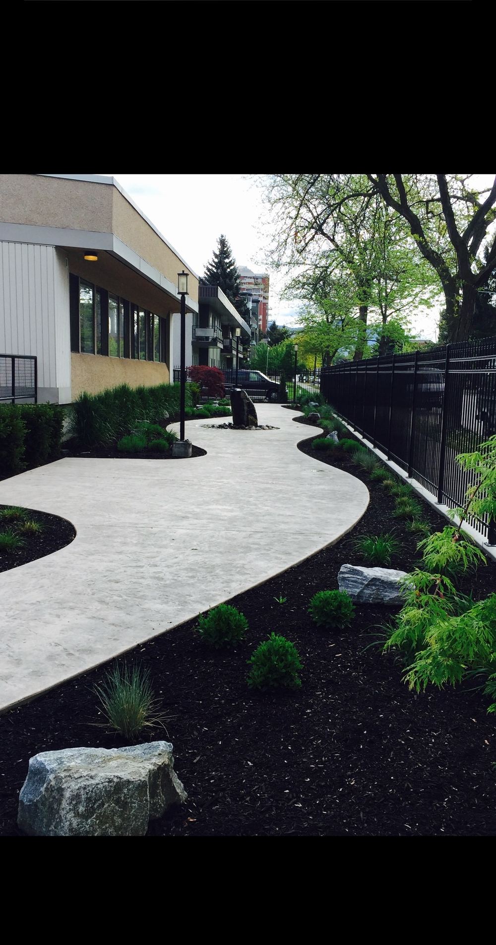 Commercial landscape with irrigated planting beds, KDT Landscaping Kelowna