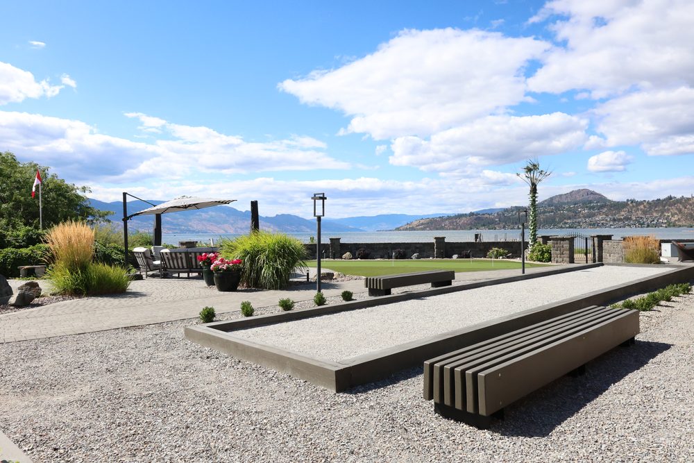 Lakefront backyard with bocce court, putting green and paver patio, KDT Landscaping Kelowna
